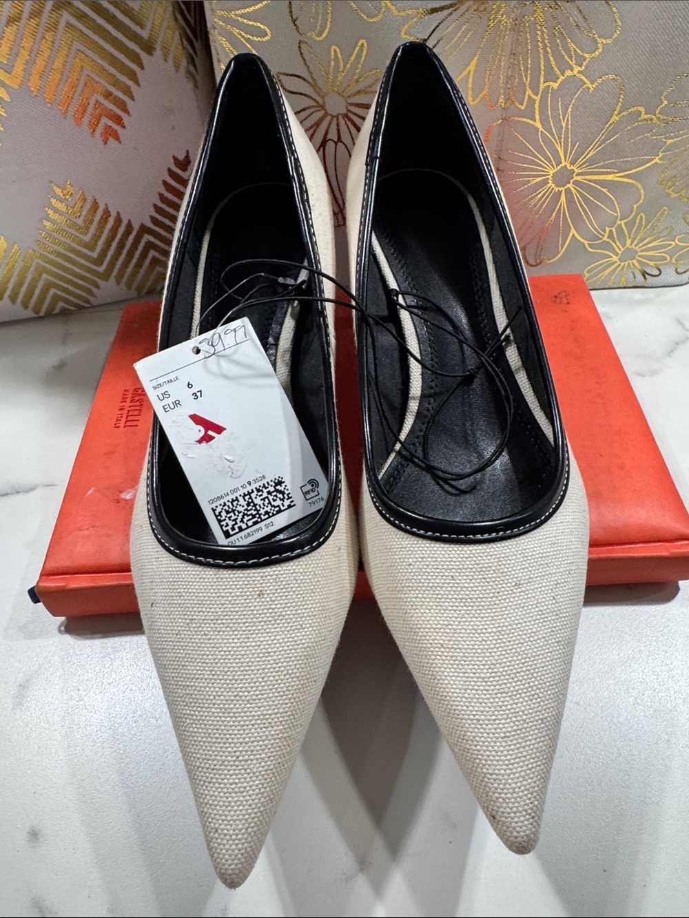 H&M Cream Pointed-Toe Pumps with Black Trim